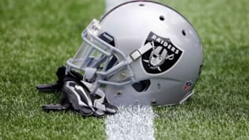 Sep 21, 2014; Foxborough, MA, USA; An Oakland Raiders helmet sits on the field before their game against the New England Patriots at Gillette Stadium. Mandatory Credit: Winslow Townson-USA TODAY Sports