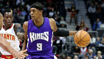 Nov 18, 2015; Atlanta, GA, USA; Sacramento Kings guard Rajon Rondo (9) drives against Atlanta Hawks guard Dennis Schroder (17) in the first quarter of their game at Philips Arena. Mandatory Credit: Jason Getz-USA TODAY Sports
