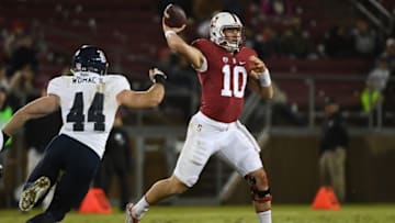 November 26, 2016; Stanford, CA, USA; Stanford Cardinal quarterback Keller Chryst (10) passes the football against Rice Owls defensive end Brian Womac (44) during the second quarter at Stanford Stadium. Mandatory Credit: Kyle Terada-USA TODAY Sports
