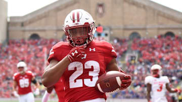 MADISON, WI - SEPTEMBER 08: Jonathan Taylor #23 of the Wisconsin Badgers rushes for a touchdown during the first half against the New Mexico Lobos at Camp Randall Stadium on September 8, 2018 in Madison, Wisconsin. (Photo by Stacy Revere/Getty Images)