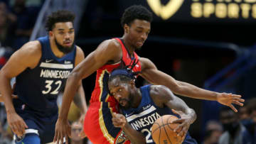 Minnesota Timberwolves guard Patrick Beverley (22) runs into New Orleans Pelicans forward Herbert Jones Credit: Chuck Cook-USA TODAY Sports
