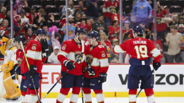 Sep 25, 2023; Sunrise, Florida, USA; Florida Panthers defenseman Dmitry Kulikov (7) celebrates with teammates after scoring against the Nashville Predators during the first period at Amerant Bank Arena. Mandatory Credit: Sam Navarro-USA TODAY Sports