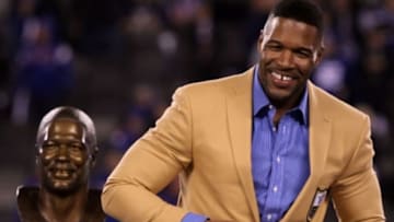 Nov 3, 2014; East Rutherford, NJ, USA; Michael Strahan receives his NFL Hall of Fame ring during the half time ceremony at MetLife Stadium. Mandatory Credit: Noah K. Murray-USA TODAY Sports