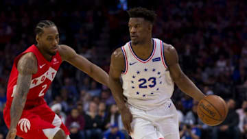 PHILADELPHIA, PA - MAY 09: Jimmy Butler #23 of the Philadelphia 76ers dribbles the ball against Kawhi Leonard #2 of the Toronto Raptors in Game Six of the Eastern Conference Semifinals at the Wells Fargo Center on May 9, 2019 in Philadelphia, Pennsylvania. The 76ers defeated the Raptors 112-101. NOTE TO USER: User expressly acknowledges and agrees that, by downloading and or using this photograph, User is consenting to the terms and conditions of the Getty Images License Agreement. (Photo by Mitchell Leff/Getty Images)