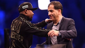 LAS VEGAS, NV - AUGUST 25: Floyd Mayweather Jr. (L) embraces Executive VP