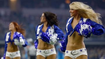 ARLINGTON, TX - NOVEMBER 26: The Dallas Cowboys Cheerleaders perform as the Dallas Cowboys take on the Carolina Panthers at AT&T Stadium on November 26, 2015 in Arlington, Texas. (Photo by Tom Pennington/Getty Images)