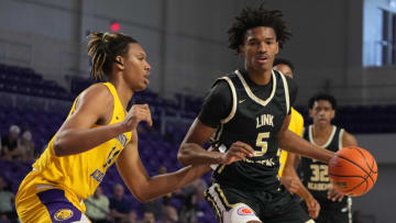 Auburn basketballApr 2, 2022; Fort Myers, FL, USA; Link Academy Lions forward Julian Phillips (5) dribbles the ball around Montverde Academy Eagles forward Malik Reneau (14) during the first half at Suncoast Credit Union Arena. Mandatory Credit: Jasen Vinlove-USA TODAY Sports