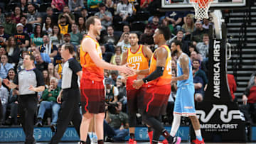 SALT LAKE CITY, UT - MARCH 17: Joe Ingles #2 and Donovan Mitchell #45 of the Utah Jazz high five during the game against the Sacramento Kings on March 17, 2018 at vivint.SmartHome Arena in Salt Lake City, Utah. NOTE TO USER: User expressly acknowledges and agrees that, by downloading and or using this Photograph, User is consenting to the terms and conditions of the Getty Images License Agreement. Mandatory Copyright Notice: Copyright 2018 NBAE (Photo by Melissa Majchrzak/NBAE via Getty Images)
