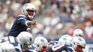 Sep 18, 2016; Foxborough, MA, USA; New England Patriots quarterback Jacoby Brissett (7) makes an adjustment at the line of scrimmage during the second quarter against the Miami Dolphins at Gillette Stadium. Mandatory Credit: Greg M. Cooper-USA TODAY Sports