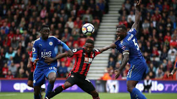 BOURNEMOUTH, ENGLAND - SEPTEMBER 30: Wilfred Ndidi of Leicester City and Wes Morgan of Leicester City battle for possession with Jermain Defoe of AFC Bournemouth during the Premier League match between AFC Bournemouth and Leicester City at Vitality Stadium on September 30, 2017 in Bournemouth, England. (Photo by Steve Bardens/Getty Images)