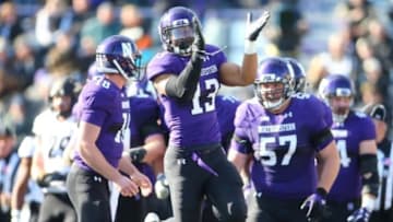 Nov 14, 2015; Evanston, IL, USA; Northwestern Wildcats running back Warren Long (13) celebrates after scoring a touchdown during the first half against the Purdue Boilermakers at Ryan Field. Mandatory Credit: Caylor Arnold-USA TODAY Sports