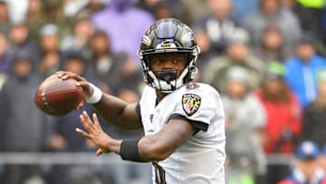SEATTLE, WASHINGTON - OCTOBER 20: Lamar Jackson #8 of the Baltimore Ravens throws the ball during the first half of the game against the Seattle Seahawks at CenturyLink Field on October 20, 2019 in Seattle, Washington. (Photo by Alika Jenner/Getty Images)