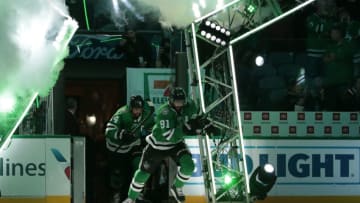 DALLAS, TX - DECEMBER 31: Tyler Seguin #91 and Jamie Benn #14 of the Dallas Stars skate onto the ice against the Montreal Canadiens at the American Airlines Center on December 31, 2018 in Dallas, Texas. (Photo by Glenn James/NHLI via Getty Images)