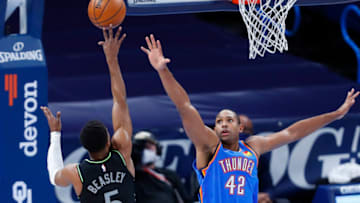 Oklahoma City Thunder center Al Horford defends a shot by Minnesota Timberwolves guard Malik Beasley. Mandatory Credit: Alonzo Adams-USA TODAY Sports