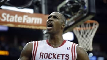 Apr 30, 2014; Houston, TX, USA; Houston Rockets center Dwight Howard (12) yells to the crowd after blocking a shot during the fourth quarter against the Portland Trail Blazers in game five of the first round of the 2014 NBA Playoffs at Toyota Center. Mandatory Credit: Andrew Richardson-USA TODAY Sports