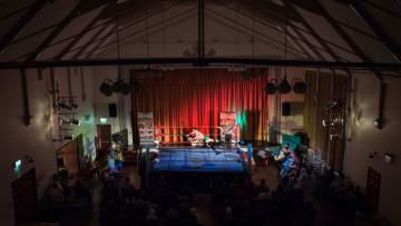 Professional wrestlers Kyle Kingsley and Michael May (R) take part in a bout during an evening of wrestling entertainment presented by promoter 'All Star Superslam Wrestling' in Rhyl, north Wales on August 15, 2017.Founded in 1970, All Star Superslam Wrestling is the oldest active wrestling promotion in the UK, staging wrestling matches in theatres, leisure centres, town halls and holiday camps across the UK. / AFP PHOTO / Oli SCARFF (Photo credit should read OLI SCARFF/AFP via Getty Images)