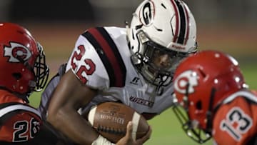 Germantown's Branson Robinson (22) runs the ball against Clinton on Friday, September 7, 2018, at Clinton High School in Clinton, Miss.09 07 Germantown Clinton 015