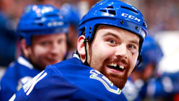 VANCOUVER, BC - MARCH 1: Zack Kassian #9 of the Vancouver Canucks watches from the bench against the St. Louis Blues during their NHL game at Rogers Arena March 1, 2015 in Vancouver, British Columbia, Canada. Vancouver won 6-5 in a shootout. (Photo by Jeff Vinnick/NHLI via Getty Images)