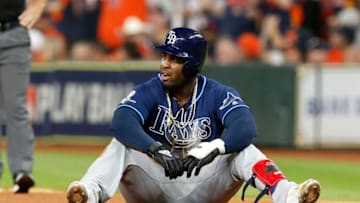 HOUSTON, TEXAS - OCTOBER 05: Yandy Diaz #2 of the Tampa Bay Rays reacts after getting out at first base during the first inning of Game 2 of the ALDS against the Houston Astros at Minute Maid Park on October 05, 2019 in Houston, Texas. (Photo by Tim Warner/Getty Images)