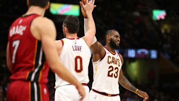 CLEVELAND, OH - NOVEMBER 28: Kevin Love #0 of the Cleveland Cavaliers celebrates a second half basket with LeBron James #23 behind Goran Dragic #7 of the Miami Heat at Quicken Loans Arena on November 28, 2017 in Cleveland, Ohio. Cleveland won the game 108-97. NOTE TO USER: User expressly acknowledges and agrees that, by downloading and or using this photograph, User is consenting to the terms and conditions of the Getty Images License Agreement. (Photo by Gregory Shamus/Getty Images)