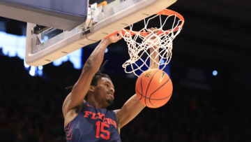 DAYTON, OHIO - NOVEMBER 19: DaRon Holmes II #15 of the Dayton Flyers dunks the ball during the first half in the game against the Robert Morris Colonials at UD Arena on November 19, 2022 in Dayton, Ohio. (Photo by Justin Casterline/Getty Images)