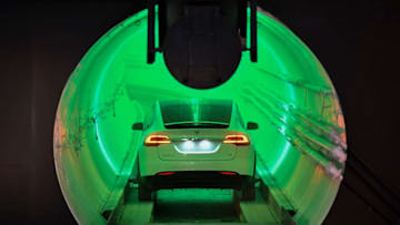 HAWTHORNE, CA - DECEMBER 18: A modified Tesla Model X electric vehicle enters a tunnel before an unveiling event for The Boring Company Hawthorne test tunnel December 18, 2018 in Hawthorne, California. On Tuesday night, The Boring Company will officially open the Hawthorne tunnel, a preview of Musk's larger vision to ease traffic in Los Angeles. (Photo by Robyn Beck-Pool/Getty Images)