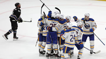 WASHINGTON, DC - JANUARY 03: Tage Thompson #72 of the Buffalo Sabres celebrates with teammates after scoring the game-winning goal against the Washington Capitals during overtime at Capital One Arena on January 3, 2023 in Washington, DC. (Photo by Patrick Smith/Getty Images)