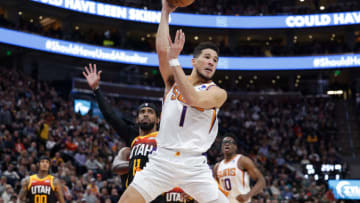 Devin Booker, Mike Conley, Phoenix Suns Credit: Chris Nicoll-USA TODAY Sports