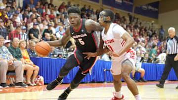 LAHAINA, HI - NOVEMBER 25: Anthony Edwards #5 of the Georgia Bulldogs dribbles by Rodney Chatman #0 of the Dayton Flyers during a first round Maui Invitation game at the Lahaina Civic Center on November 25, 2019 in Lahaina, Hawaii. (Photo by Mitchell Layton/Getty Images)