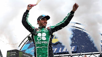 DOVER, DELAWARE - OCTOBER 06: Kyle Larson, driver of the #42 Clover Chevrolet, celebrates in Victory Lane after winning the Monster Energy NASCAR Cup Series Drydene 400 at Dover International Speedway on October 06, 2019 in Dover, Delaware. (Photo by Matt Sullivan/Getty Images)