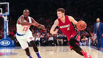 Nov 27, 2015; New York, NY, USA; Miami Heat guard Tyler Johnson (8) drives around New York Knicks guard Jerian Grant (13) during the first quarter at Madison Square Garden. Mandatory Credit: Anthony Gruppuso-USA TODAY Sports