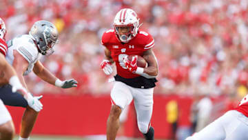 Sep 11, 2021; Madison, Wisconsin, USA; Wisconsin Badgers running back Jalen Berger (8) during the game against the Eastern Michigan Eagles at Camp Randall Stadium. Mandatory Credit: Jeff Hanisch-USA TODAY Sports