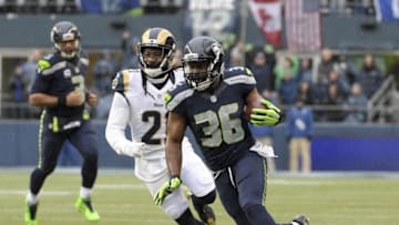 Dec 27, 2015; Seattle, WA, USA; Seattle Seahawks running back Bryce Brown (36) is defended by St. Louis Rams cornerback Trumaine Johnson (22) during an NFL football game at CenturyLink Field. Mandatory Credit: Kirby Lee-USA TODAY Sports