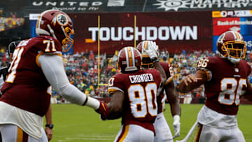 LANDOVER, MD - SEPTEMBER 23: Jamison Crowder #80 of the Washington Redskins celebrates with Jeremy Sprinkle #87 after a touchdown in the second quarter against the Green Bay Packers at FedExField on September 23, 2018 in Landover, Maryland. (Photo by Todd Olszewski/Getty Images)