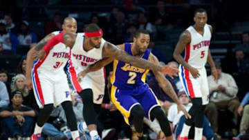 Dec 2, 2014; Auburn Hills, MI, USA; Detroit Pistons forward Josh Smith (6) and Los Angeles Lakers guard Wayne Ellington (2) battle for the ball during the third quarter at The Palace of Auburn Hills. Mandatory Credit: Tim Fuller-USA TODAY Sports