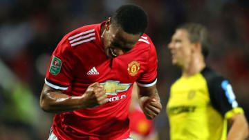 MANCHESTER, ENGLAND - SEPTEMBER 20: Anthony Martial of Manchester United celebrates scoring his sides fourth goal during the Carabao Cup Third Round match between Manchester United and Burton Albion at Old Trafford on September 20, 2017 in Manchester, England. (Photo by Richard Heathcote/Getty Images)