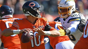 CHICAGO, ILLINOIS - OCTOBER 27: Mitchell Trubisky #10 of the Chicago Bears is pursued by Isaac Rochell #98 of the Los Angeles Chargers during the first quarter of a game at Soldier Field on October 27, 2019 in Chicago, Illinois. (Photo by Stacy Revere/Getty Images)