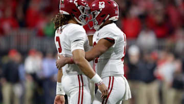 ATLANTA, GA - JANUARY 08: Tua Tagovailoa #13 celebrates a touchdown pass with Jalen Hurts #2 of the Alabama Crimson Tide during the third quarter against the Georgia Bulldogs in the CFP National Championship presented by AT&T at Mercedes-Benz Stadium on January 8, 2018 in Atlanta, Georgia. (Photo by Streeter Lecka/Getty Images)