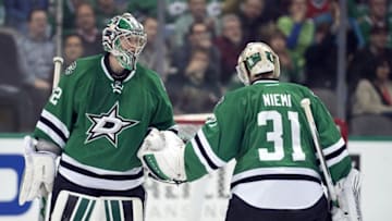 Dec 8, 2015; Dallas, TX, USA; Dallas Stars goalie Antti Niemi (31) replaces goalie Kari Lehtonen (32) in net during the third period against the Carolina Hurricanes at the American Airlines Center. The Stars defeat the Hurricanes 6-5. Mandatory Credit: Jerome Miron-USA TODAY Sports