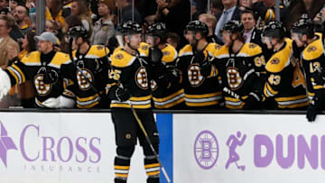 BOSTON, MA - OCTOBER 29: Boston Bruins right defenseman Brandon Carlo (25) accepts congratulations after scoring during a game between the Boston Bruins and the San Jose Sharks on October 29, 2019, at TD Garden in Boston, Massachusetts. (Photo by Fred Kfoury III/Icon Sportswire via Getty Images)