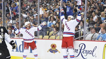 PITTSBURGH, PA - MAY 13: Dominic Moore #28 of the New York Rangers, left, and Brian Boyle #22 of the New York Rangers celebrate after Boyle scored a goal against the Pittsburgh Penguins in the first period in Game Seven of the Second Round of the 2014 NHL Stanley Cup Playoffs on May 13, 2014 at CONSOL Energy Center in Pittsburgh, Pennsylvania. (Photo by Jamie Sabau/Getty Images)