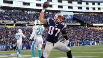 Dec 14, 2014; Foxborough, MA, USA; New England Patriots tight end Rob Gronkowski (87) celebrates after scoring a touchdown during the second half against the Miami Dolphins at Gillette Stadium. The Patriots won 41-13. Mandatory Credit: Winslow Townson-USA TODAY Sports