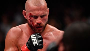 SINGAPORE - JUNE 23: (L-R) Donald Cerrone battles Leon Edwards of Jamaica in their welterweight bout during the UFC Fight Night event at the Singapore Indoor Stadium on June 23, 2018 in Singapore. (Photo by Jeff Bottari/Zuffa LLC/Zuffa LLC via Getty Images)