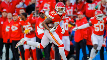 KANSAS CITY, MO - DECEMBER 12: Armani Watts #23 of the Kansas City Chiefs runs with a fumble during the fourth quarter, later ruled down, against the Las Vegas Raiders at Arrowhead Stadium on December 12, 2021 in Kansas City, Missouri. (Photo by David Eulitt/Getty Images)
