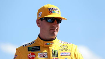 DAYTONA BEACH, FL - FEBRUARY 17: Kyle Busch, driver of the #18 M&M's Chocolate Bar Toyota, is introduced before the Monster Energy NASCAR Cup Series 61st Annual Daytona 500 at Daytona International Speedway on February 17, 2019 in Daytona Beach, Florida. (Photo by Sean Gardner/Getty Images)