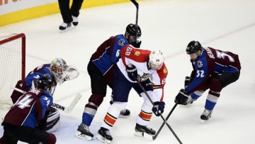 Mar 3, 2016; Denver, CO, USA; Florida Panthers right wing Jaromir Jagr (68) is defended on during a power play by Colorado Avalanche center Carl Soderberg (34) and goalie Calvin Pickard (31) and defenseman Erik Johnson (6) and defenseman Francois Beauchemin (32) in the second period at the Pepsi Center. Mandatory Credit: Ron Chenoy-USA TODAY Sports