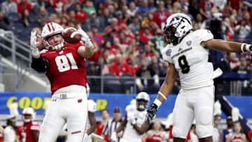 Jan 2, 2017; Arlington, TX, USA; Wisconsin Badgers tight end Troy Fumagalli (81) drops a touchdown pass in front of Western Michigan Broncos linebacker Caleb Bailey (8) during the first half of the 2017 Cotton Bowl at AT&T Stadium. Mandatory Credit: Kevin Jairaj-USA TODAY Sports