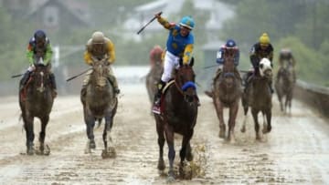 May 16, 2015; Baltimore, MD, USA; Victor Espinoza aboard American Pharoah celebrate winning the 140th Preakness Stakes at Pimlico Race Course. Mandatory Credit: Winslow Townson-USA TODAY Sports