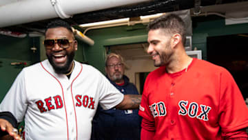 BOSTON, MA - SEPTEMBER 9: Former designated hitter David Ortiz #34 of the Boston Red Sox greets J.D. Martinez #28 of the Boston Red Sox before throwing out a ceremonial first pitch as he returns to Fenway Park before a game against the New York Yankees on September 9, 2019 at Fenway Park in Boston, Massachusetts. (Photo by Billie Weiss/Boston Red Sox/Getty Images)
