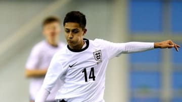 BURTON-UPON-TRENT, ENGLAND - FEBRUARY 11: Yan Dhanda of England in action during a U16 International match between England and Denmark at St Georges Park on February 11, 2014 in Burton-upon-Trent, England. (Photo by Ben Hoskins/Getty Images)